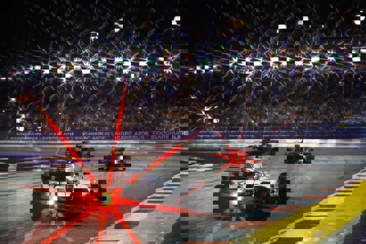 Drivers tackle Turns 2 and 3-min.jpg